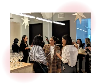 People talking at Toast event in 2024