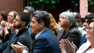 Charles Assaf applauding