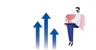 Upward arrows and a person using a laptop